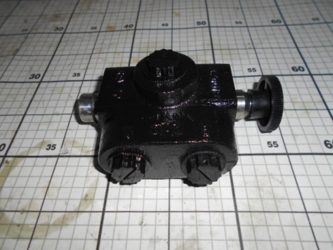 Кран распределитель шнека 1021498 фото 1